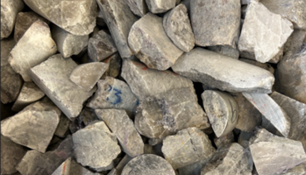 Pollucite concentrate (~12% Cs2O) produced from prior XRT ore sorting program (see news release dated October 9, 2025), of which a portion was used as feed for the bench-scale caesium extraction and recovery program through Koch Technology Solutions discussed herein. Photo: PMET Resources Inc.
