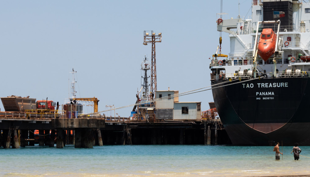 Truck prepares to load scrap steel onto the first of 10 shipments from the Gove demolition. Each ship will carry around 15,000 tonnes, or the equivalent of two Eiffel Towers of steel. Photo: Rio Tinto