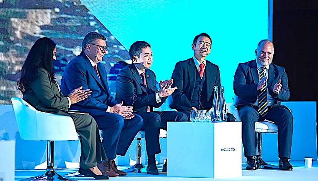 Uranium demand is growing faster in the East than in the West, while large data centre operators are exploring the possibility of securing nuclear fuel supplies. Kazatomprom’s Dastan Kosherbayev is pictured at the centre during the World Nuclear Symposium 2026. Photo: World Nuclear Association.

