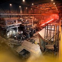 Hot rolling of a steel plate at Outokumpu’s Tornio site in Finland in January 2026. The company is developing new methods to reduce emissions from stainless steel production. Photo: Outokumpu.