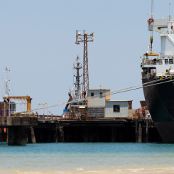 Truck prepares to load scrap steel onto the first of 10 shipments from the Gove demolition. Each ship will carry around 15,000 tonnes, or the equivalent of two Eiffel Towers of steel. Photo: Rio Tinto