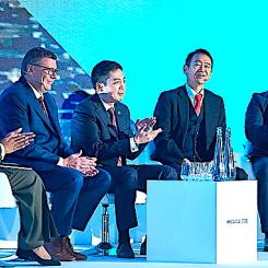 Uranium demand is growing faster in the East than in the West, while large data centre operators are exploring the possibility of securing nuclear fuel supplies. Kazatomprom’s Dastan Kosherbayev is pictured at the centre during the World Nuclear Symposium 2026. Photo: World Nuclear Association.